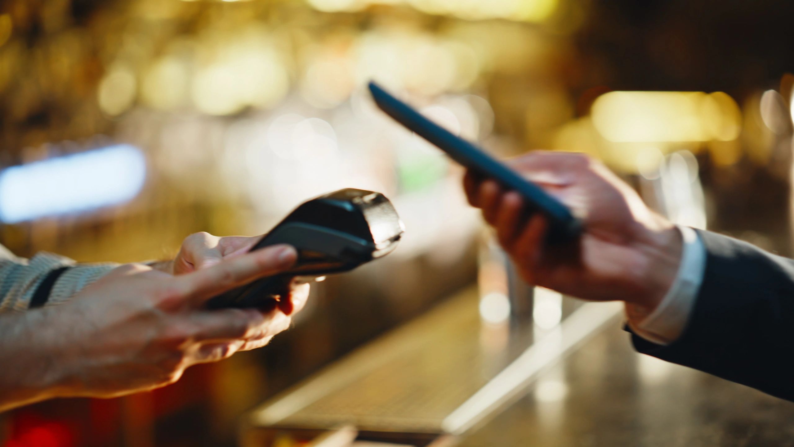 Contactless payment at a busy bar