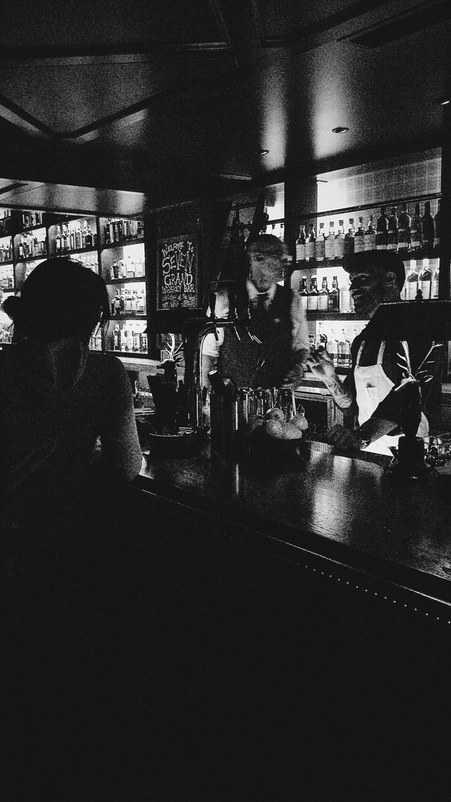 Black and white bar interior — high volume hospitality